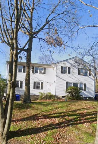 a view of a house with a big yard