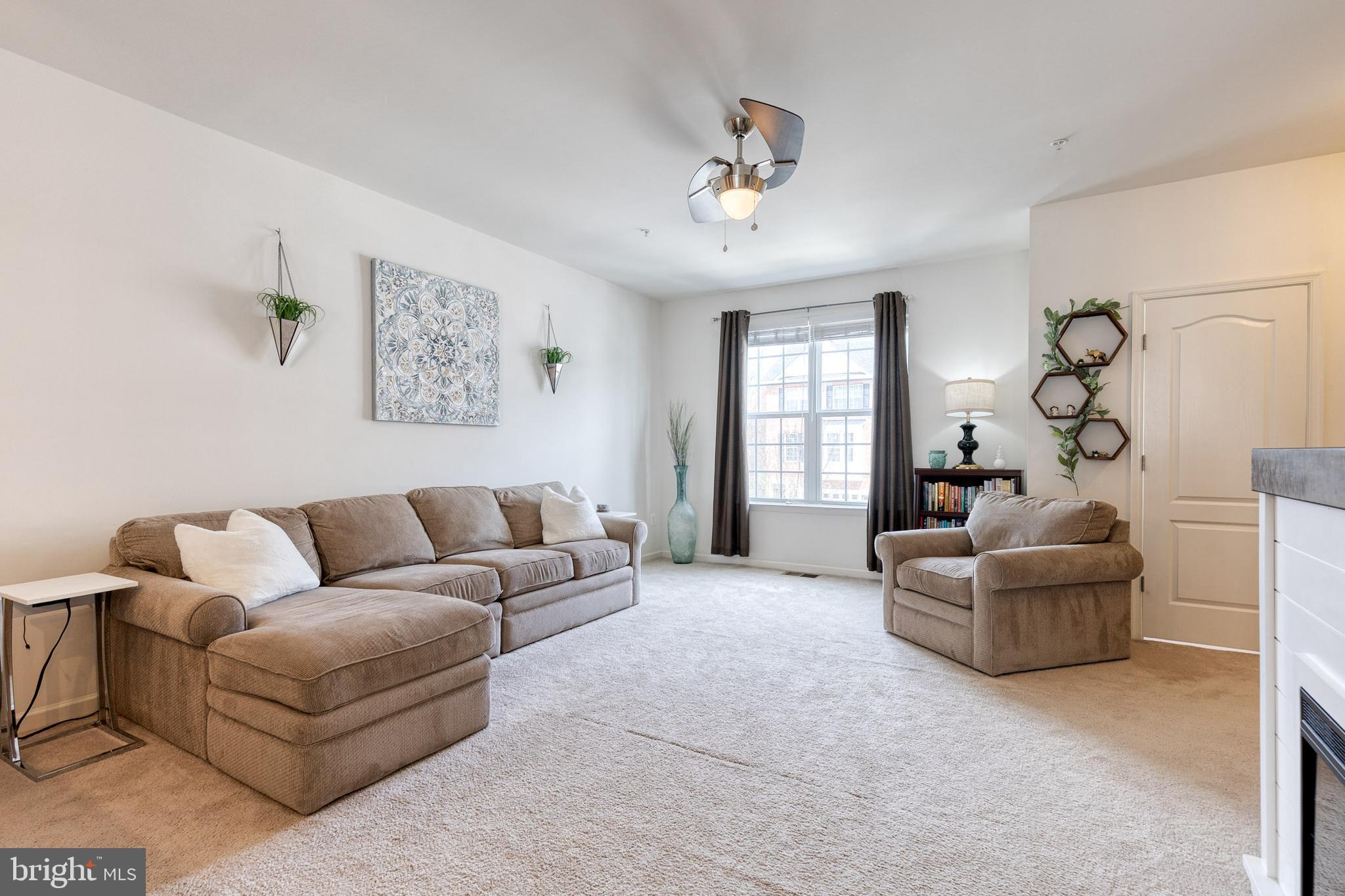 906 Sandy Run Road Baltimore, MD 21220 - Photo 6 of 31 a living room with furniture and a window