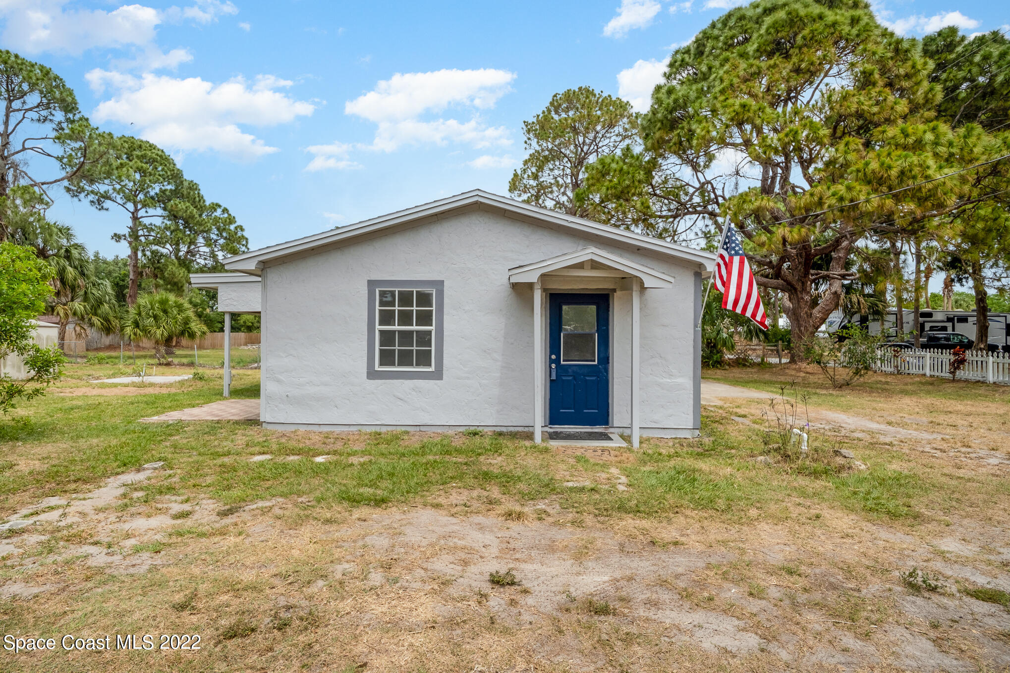 150 Capron Road Cocoa, FL 32927 - Photo 20 of 20 a house that has a tree in front of it