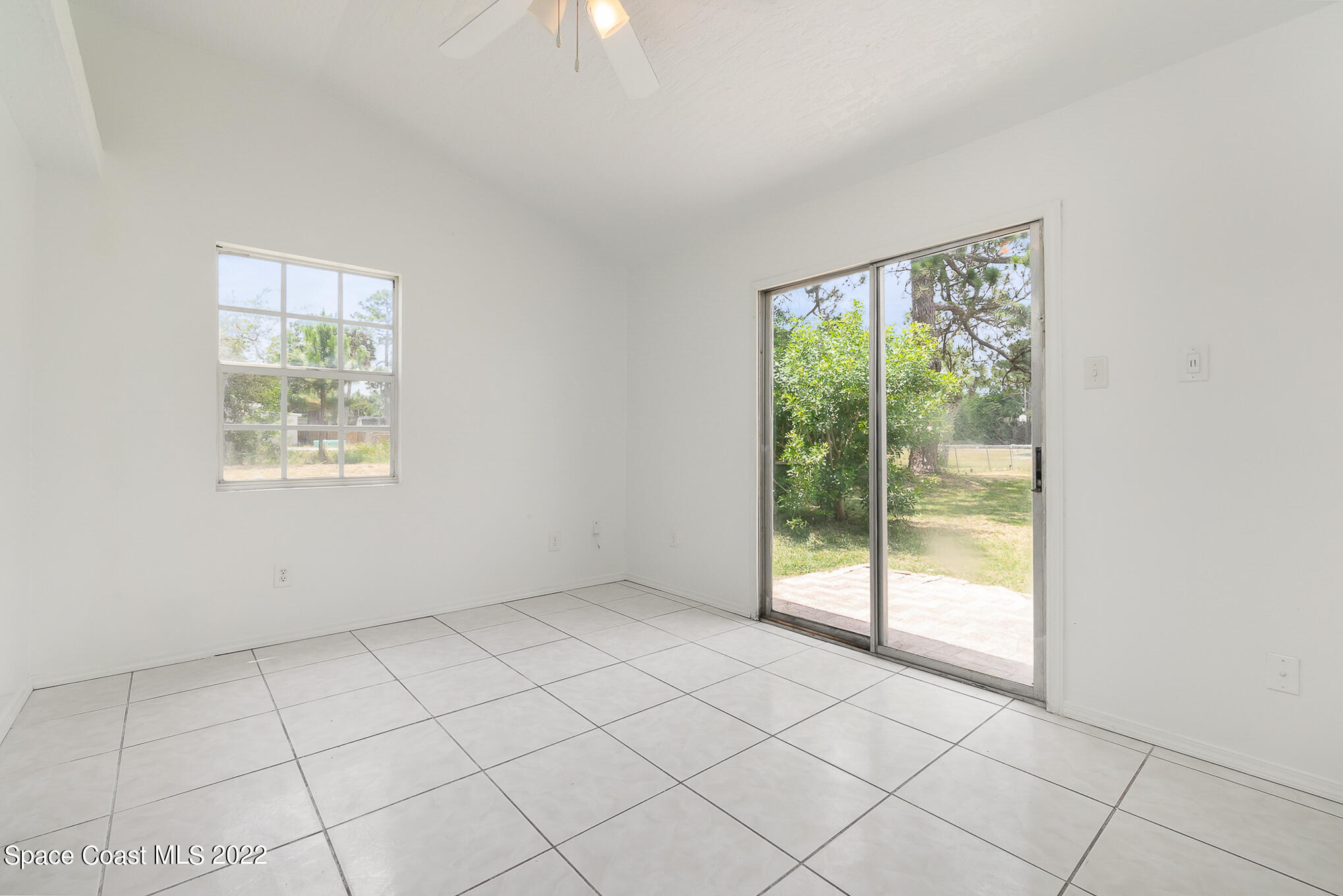 150 Capron Road Cocoa, FL 32927 - Photo 7 of 20 an empty room with windows