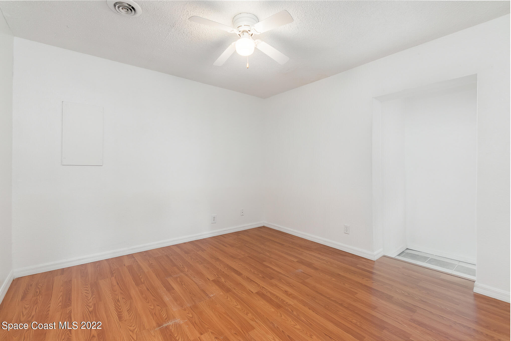150 Capron Road Cocoa, FL 32927 - Photo 10 of 20 a view of empty room with wooden floor