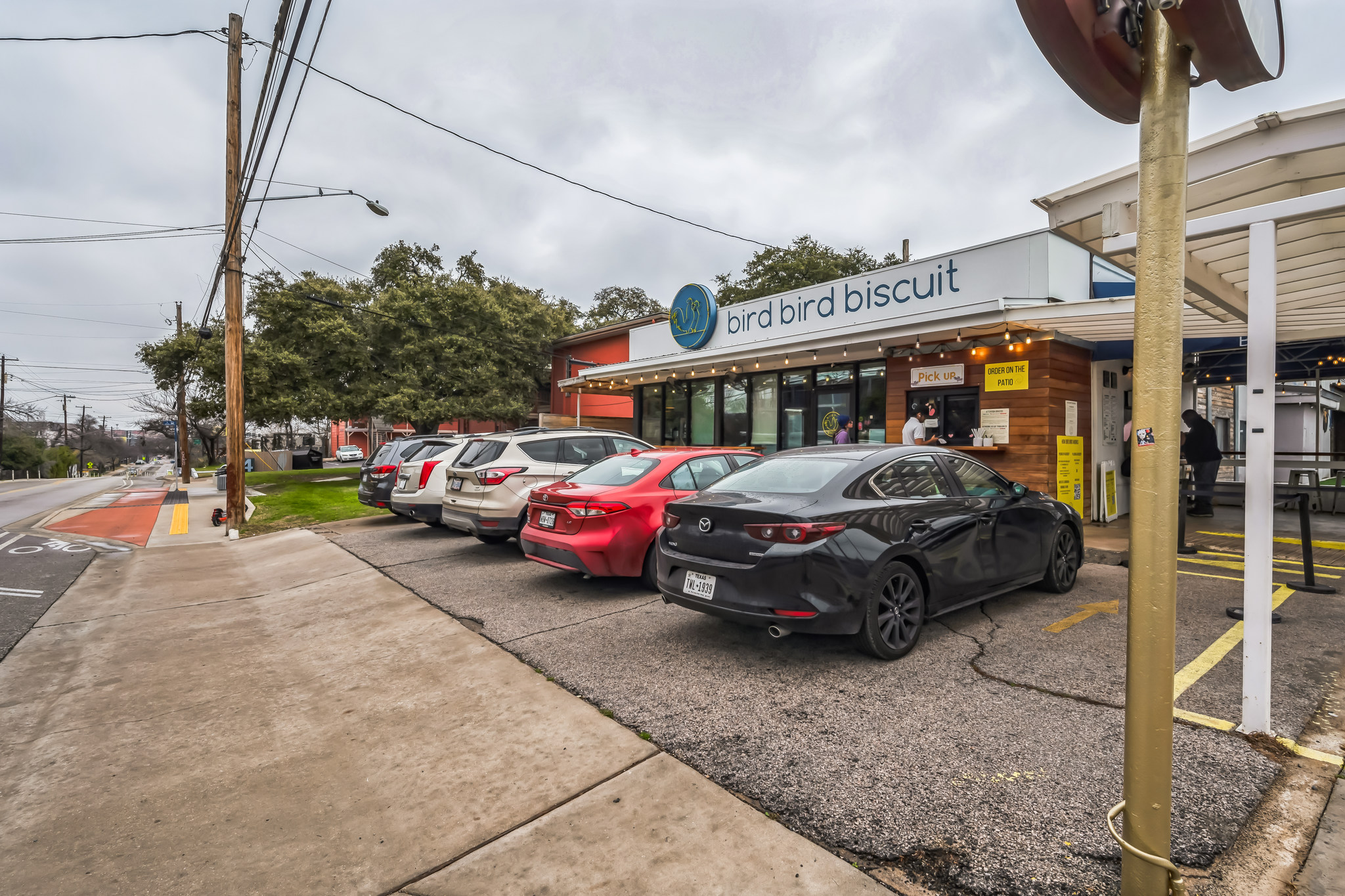 2827 Manor Road, Unit 3104 Austin, TX 78722 - Photo 29 of 30 A well-maintained facade with street-side parking defines this inviting commercial property.