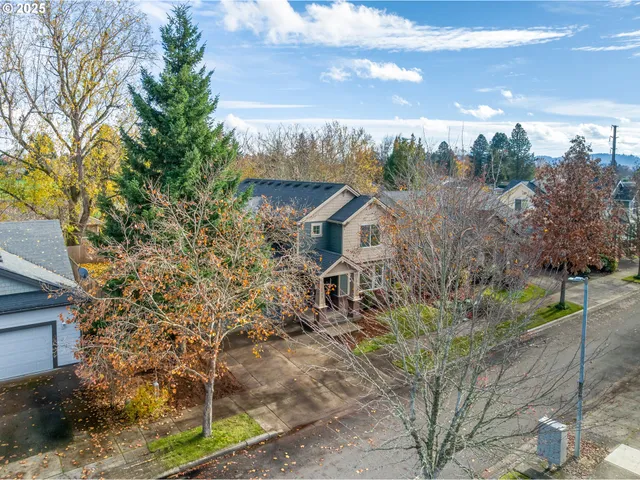an aerial view of a houses with outdoor space