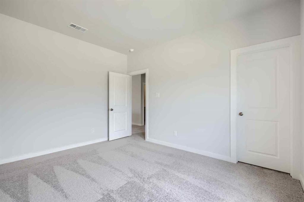 736 Vineyard Way Forney, TX 75126 - Photo 18 of 40 a view of an empty room