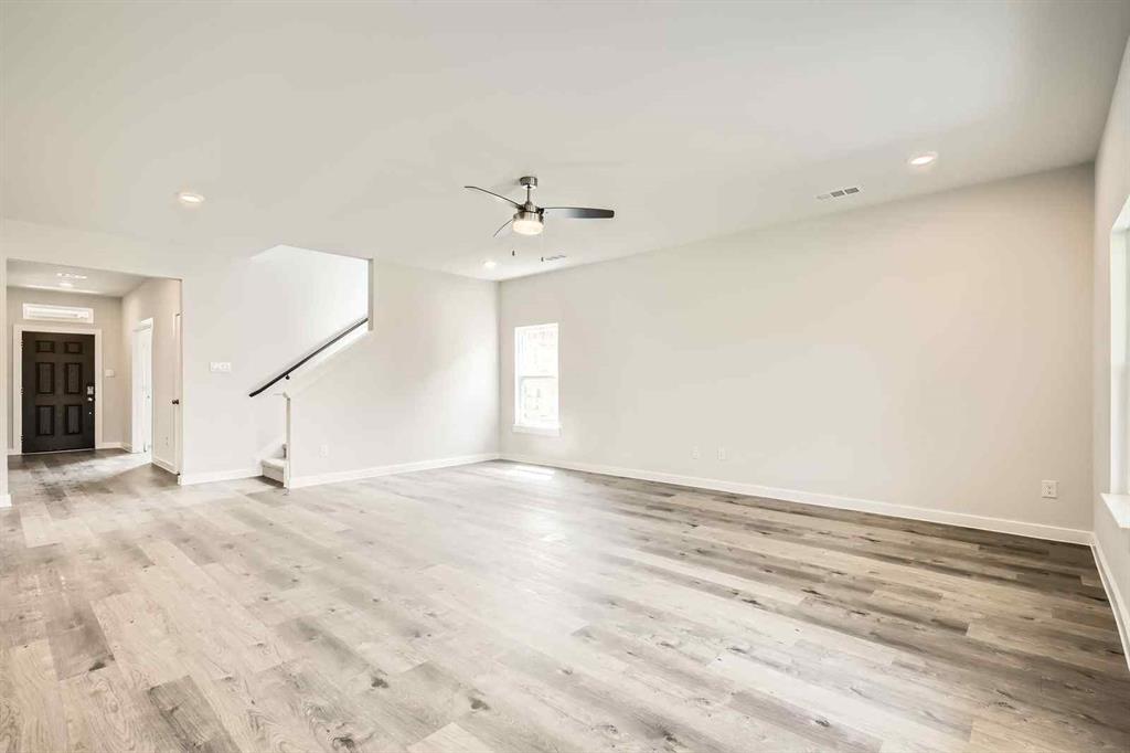 736 Vineyard Way Forney, TX 75126 - Photo 4 of 40 a view of a room with natural light