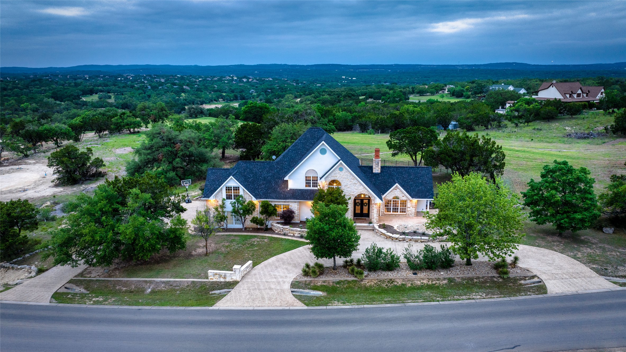 an aerial view of house with yard