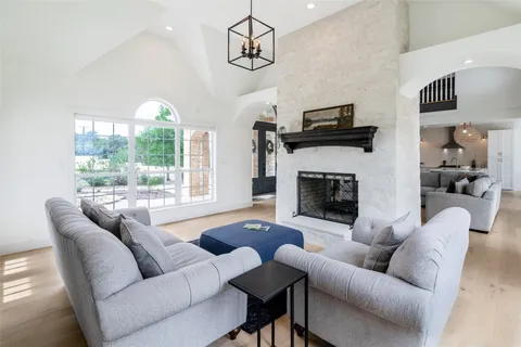 a kitchen with sink and cabinets