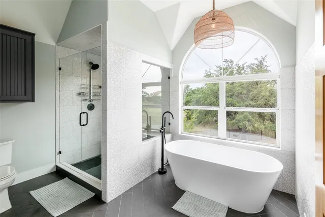 a bathroom with a sink double vanity and a mirror