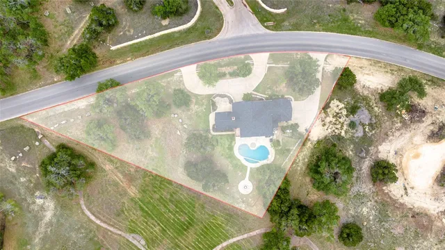 a view of swimming pool from a balcony