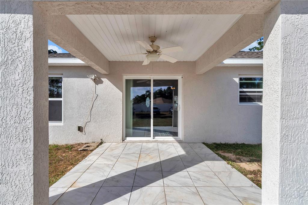 14 Maple Run Ocala, FL 34472 - Photo 12 of 43 a bathroom with a tub shower and a sink
