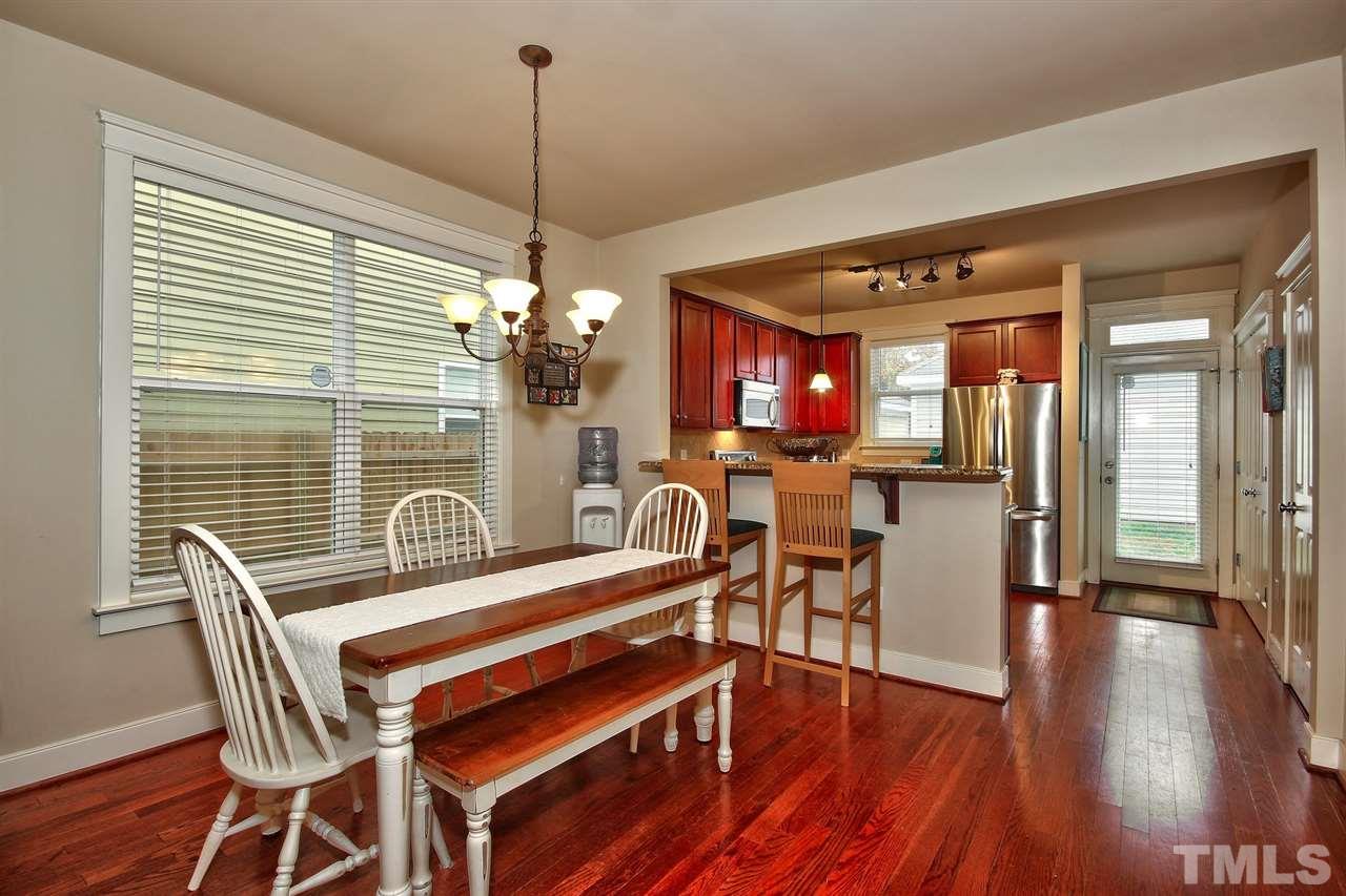 4523 All Points View Way Raleigh, NC 27614 - Photo 3 of 21 a view of a dining room with furniture and wooden floor