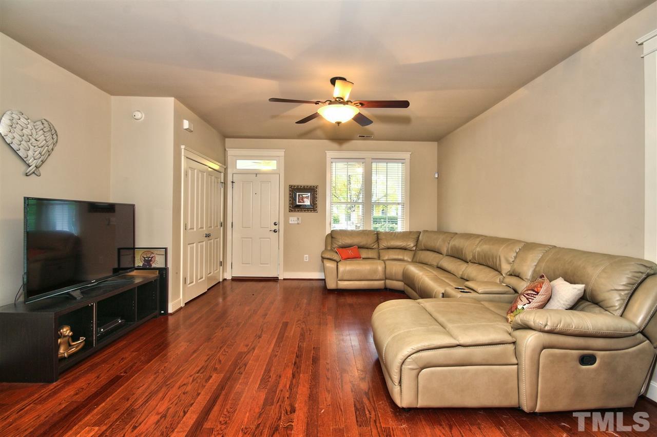 4523 All Points View Way Raleigh, NC 27614 - Photo 6 of 21 a living room with furniture and a flat screen tv