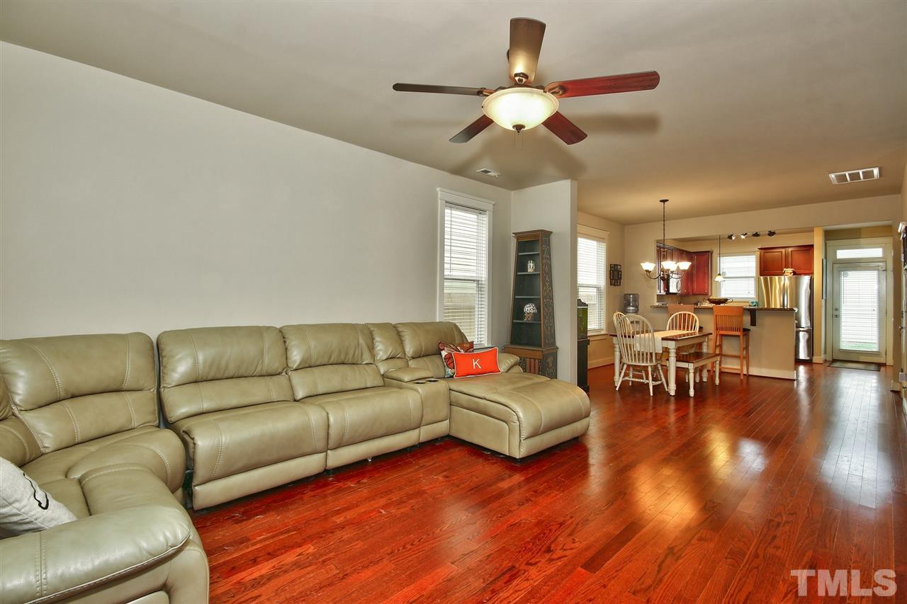 4523 All Points View Way Raleigh, NC 27614 - Photo 8 of 21 a living room with furniture and wooden floor