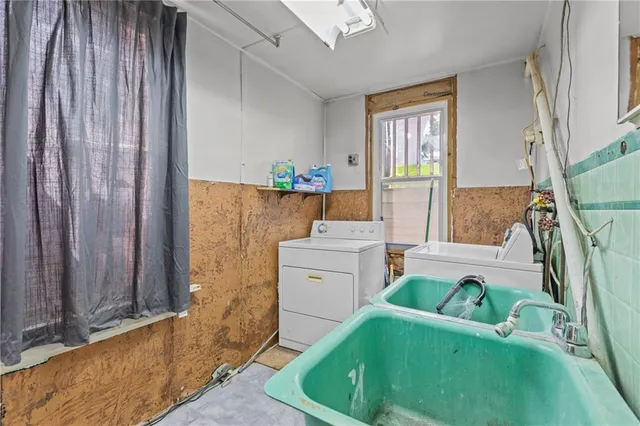 a bedroom with a bed and a desk