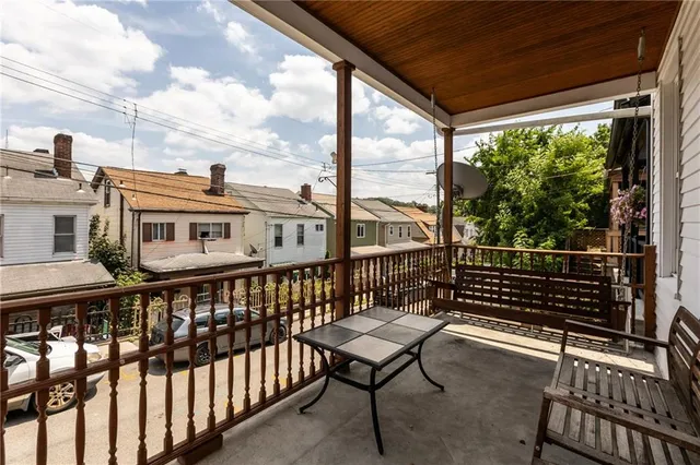 a bathroom with a sink toilet and mirror