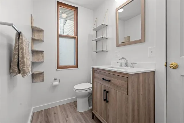 a kitchen that has a cabinets and a stove