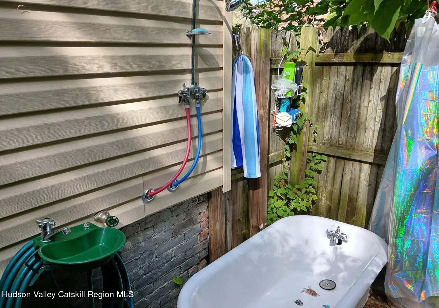 311 Spring Street Port Ewen, NY 12466 - Photo 29 of 45 a bathroom with a bathtub and shower