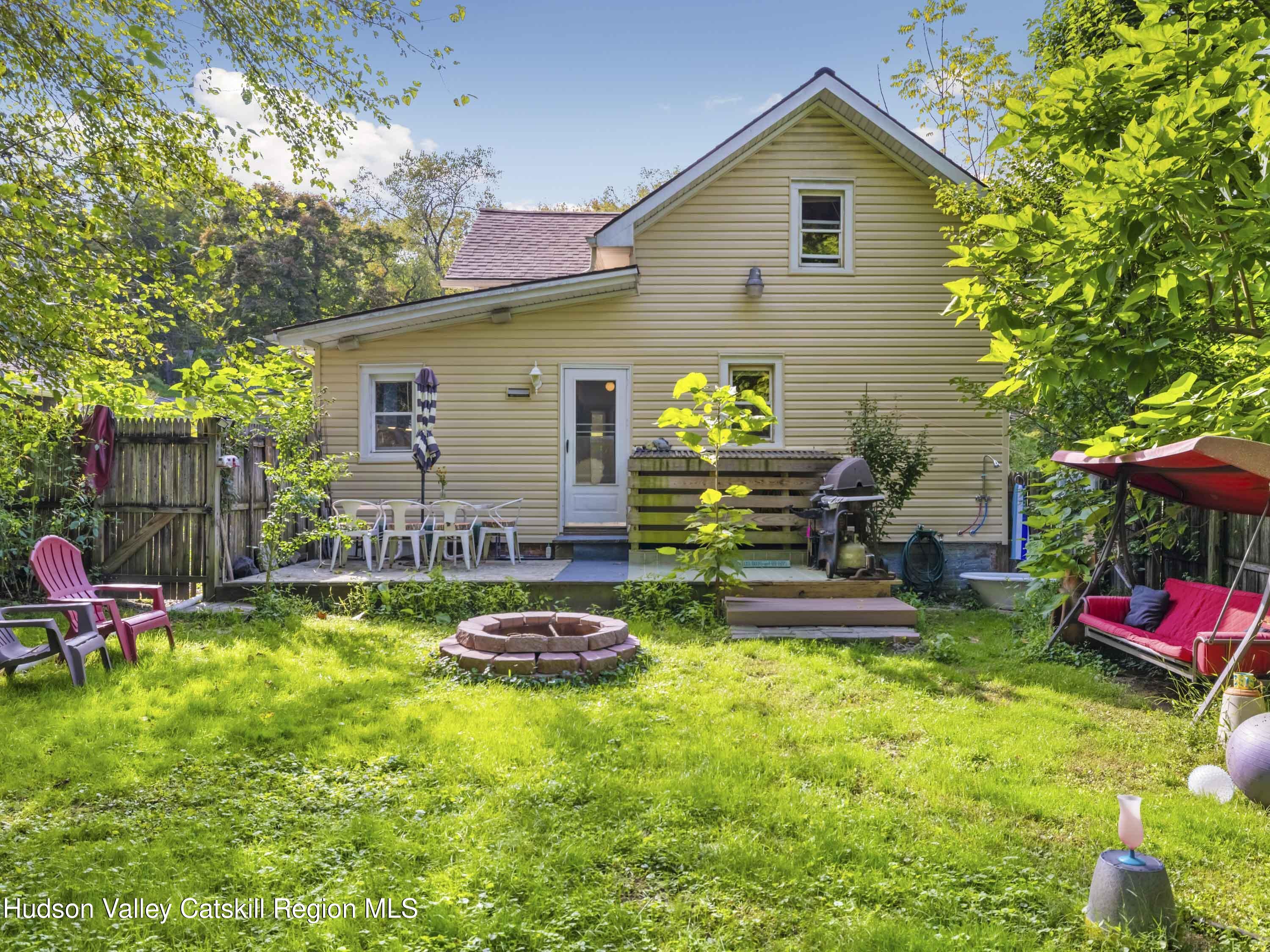 311 Spring Street Port Ewen, NY 12466 - Photo 30 of 45 a front view of a house with patio