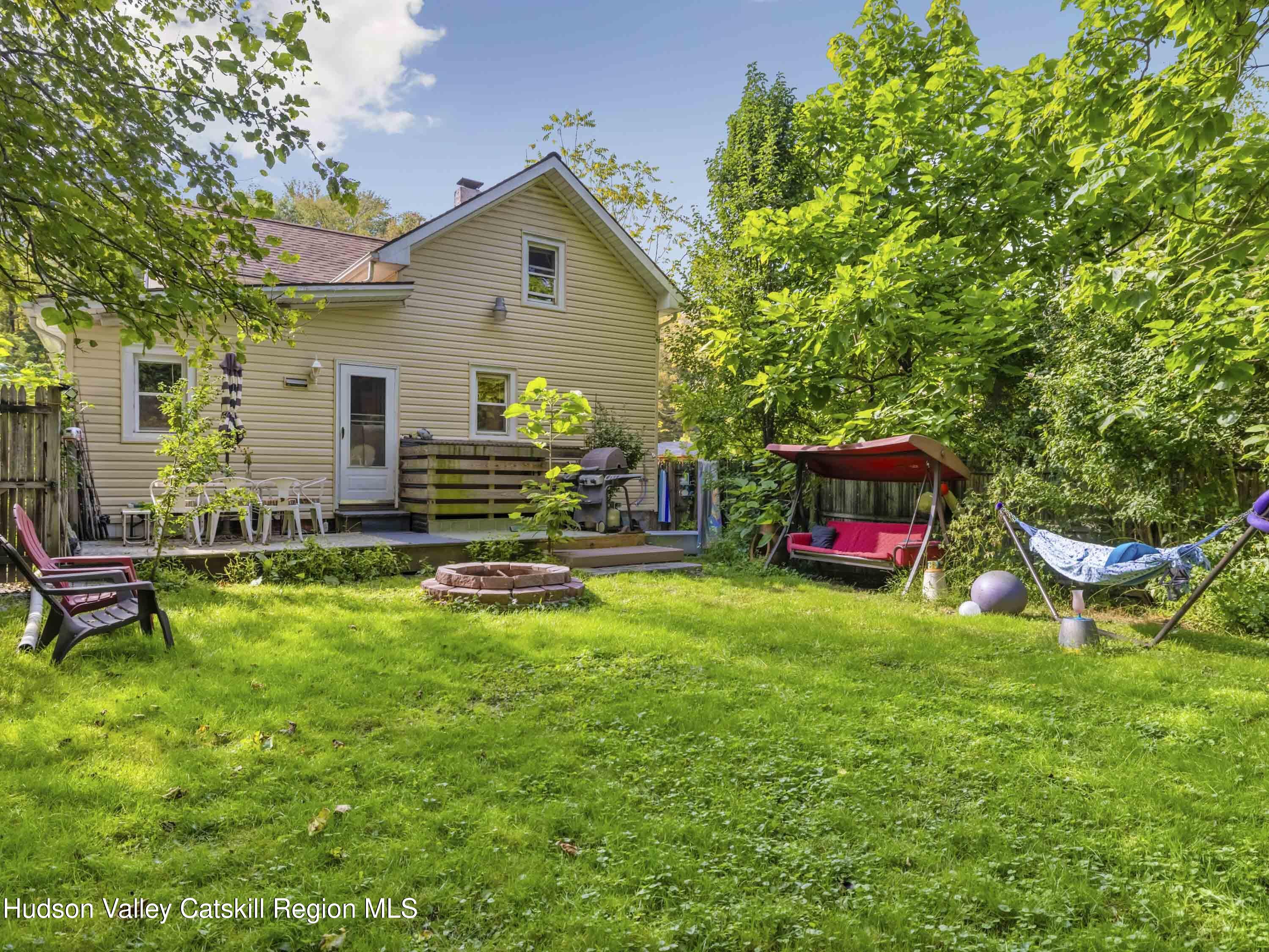 311 Spring Street Port Ewen, NY 12466 - Photo 32 of 45 a front view of a house with garden