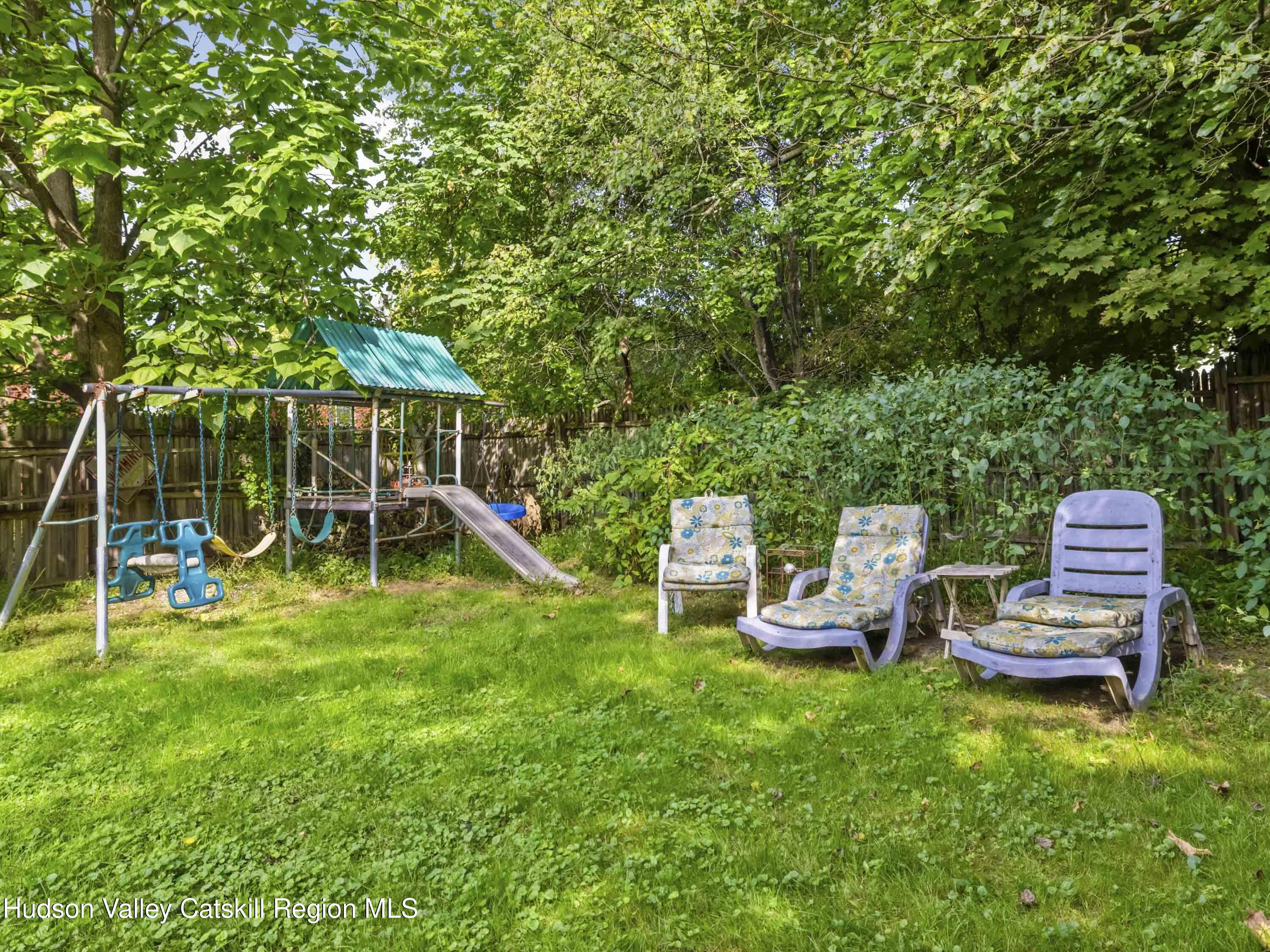 311 Spring Street Port Ewen, NY 12466 - Photo 34 of 45 a view of a chair and table in the garden