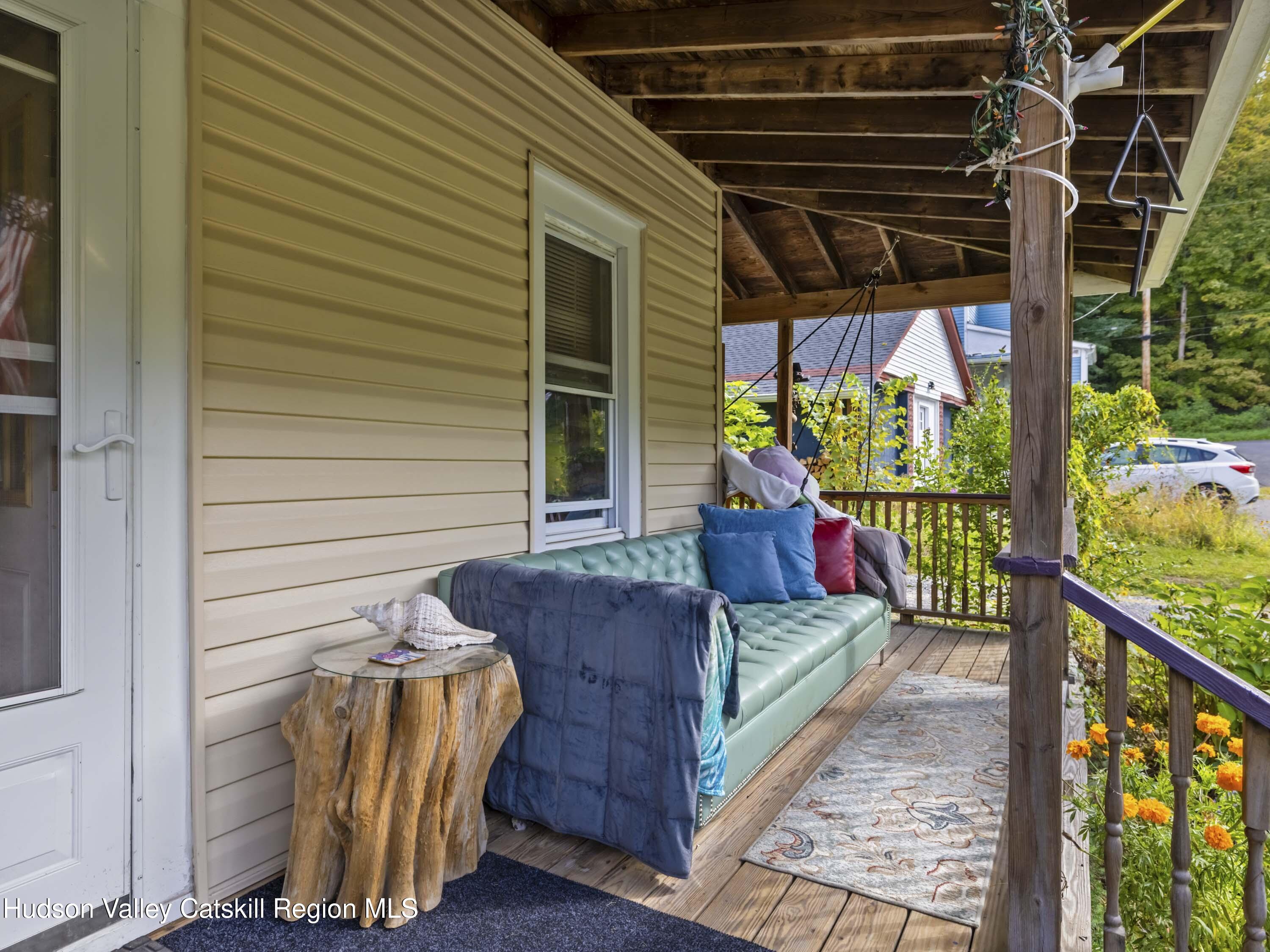 311 Spring Street Port Ewen, NY 12466 - Photo 6 of 45 a view of a porch with furniture