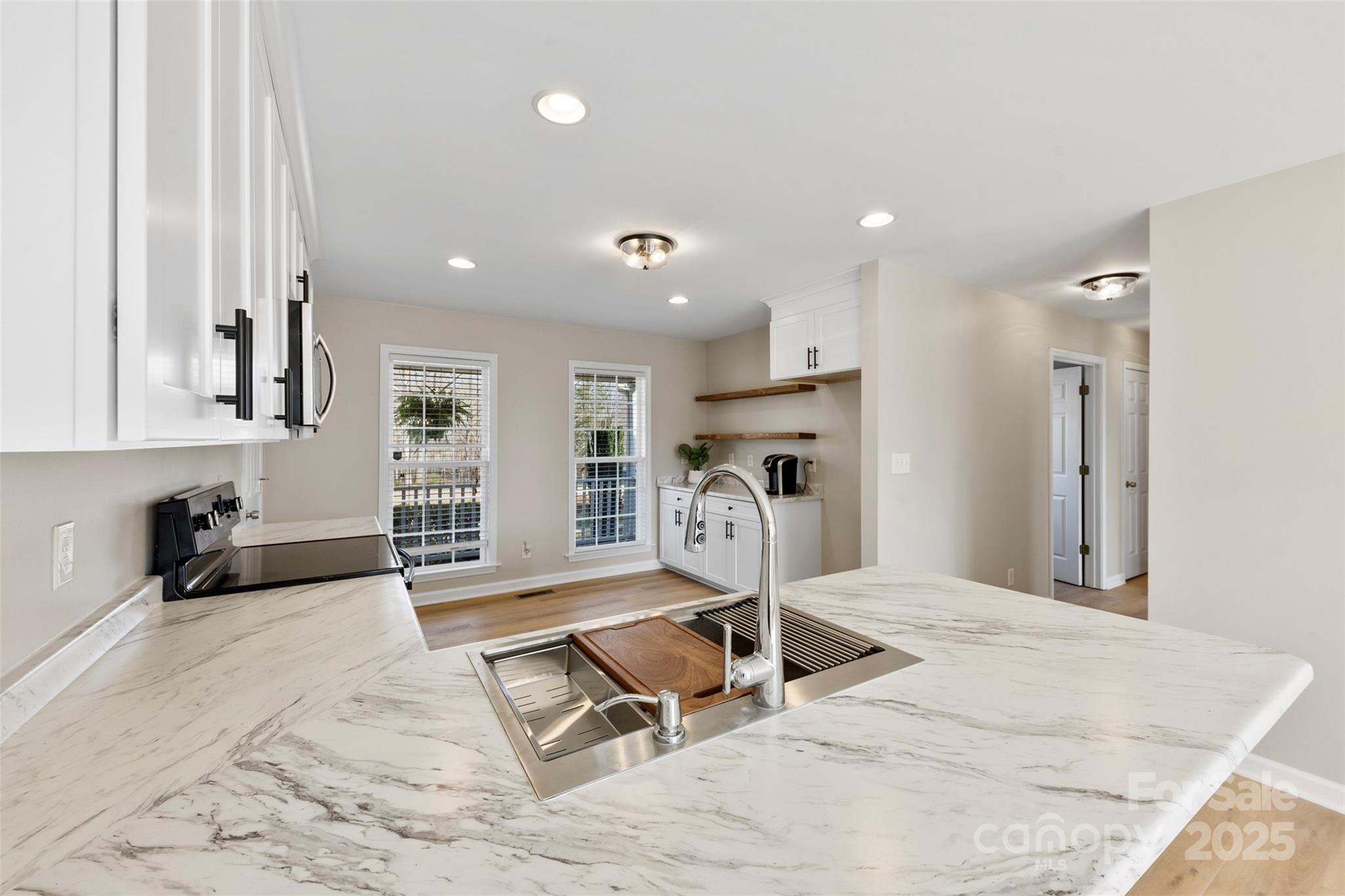 106 Springfield Drive Gaffney, SC 29341 - Photo 13 of 31 a view of a kitchen with refrigerator and windows