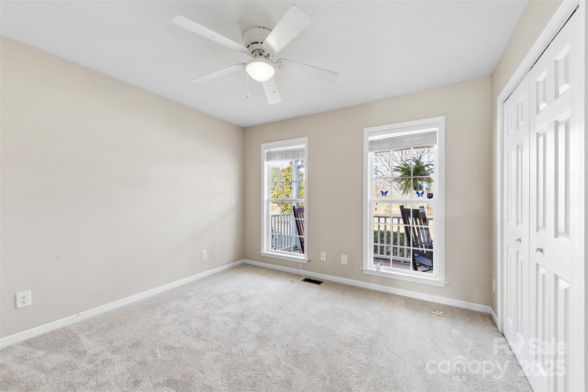 106 Springfield Drive Gaffney, SC 29341 - Photo 19 of 31 an empty room with windows and ceiling fan