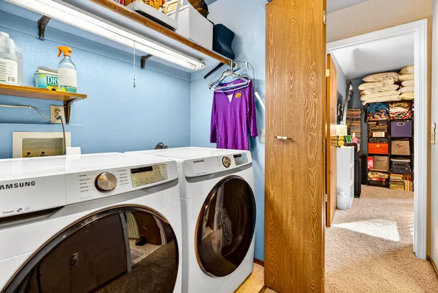 a utility room with dryer and washer