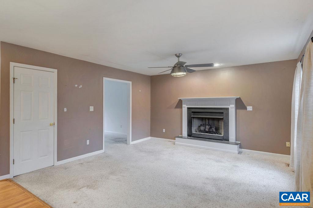 46 Laguna Road Palmyra, VA 22963 - Photo 4 of 37 a view of an empty room with a fireplace