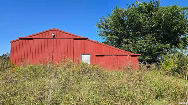 a view of a back yard of the house