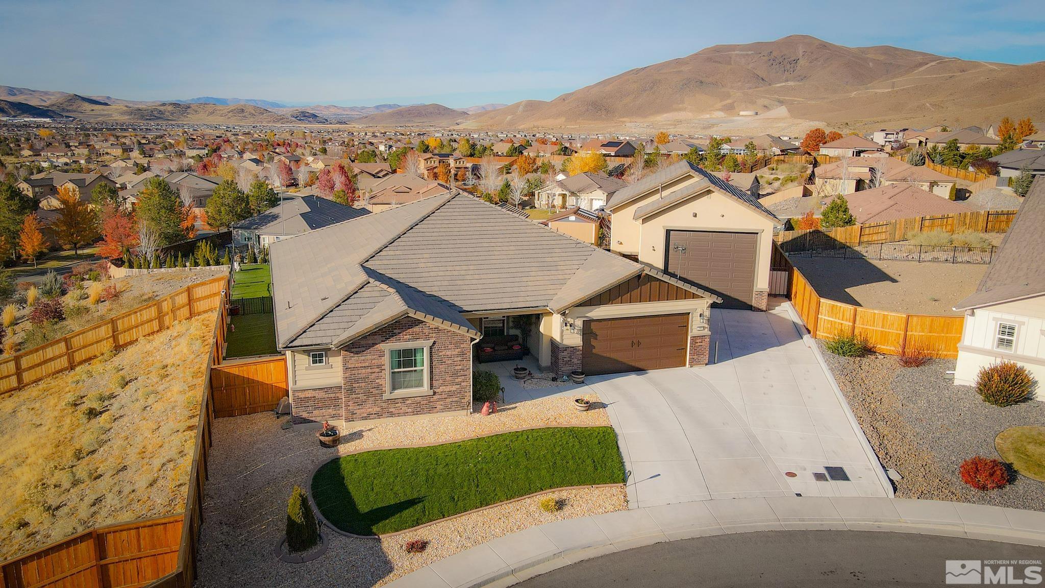 200 Noble Metal Court Reno, NV 89521 - Photo 3 of 39 an aerial view of a house with a mountain