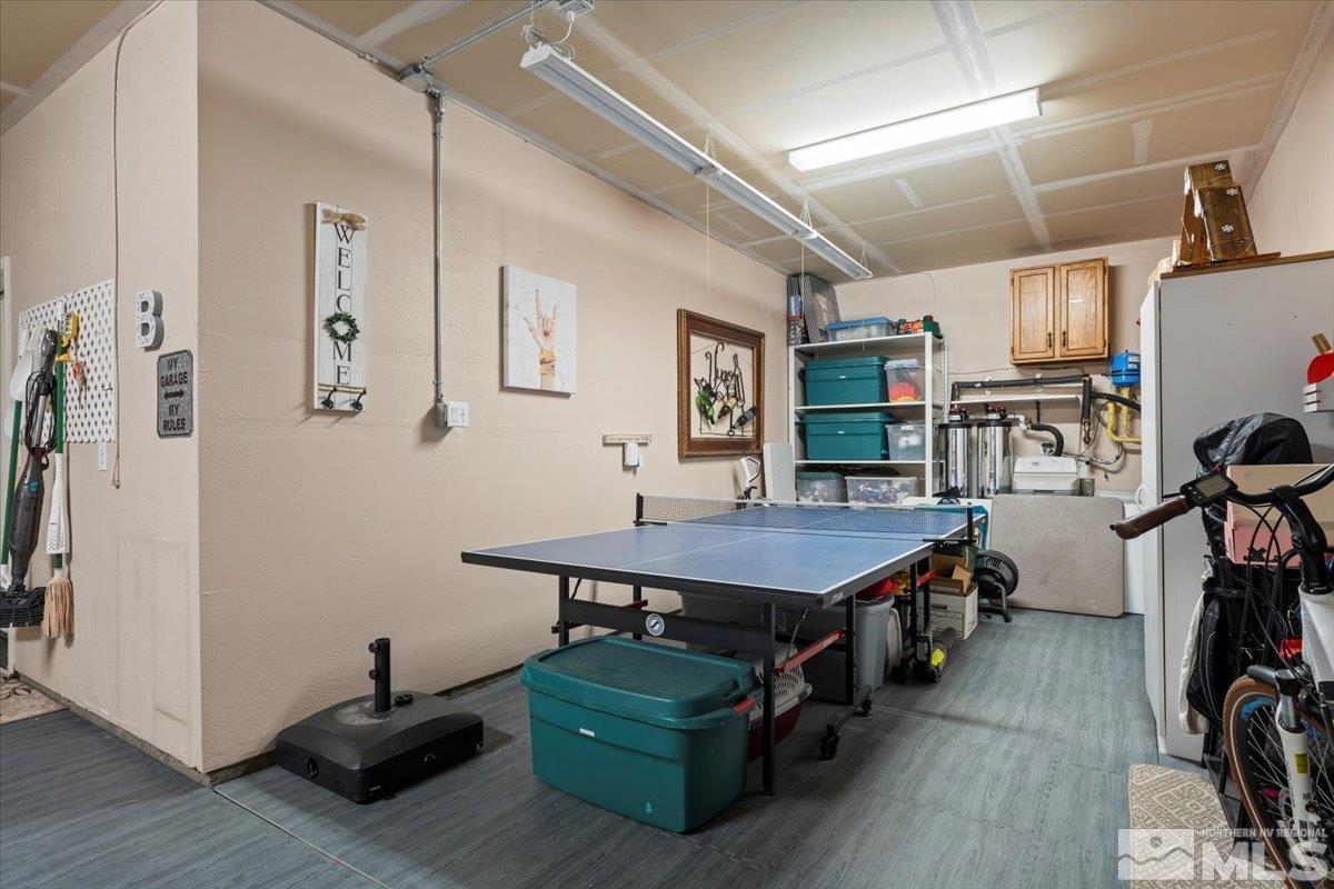 200 Noble Metal Court Reno, NV 89521 - Photo 34 of 39 a room with furniture and wooden floor