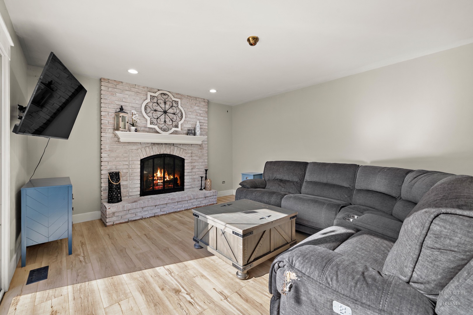 56 Huntcliff Court Fox River Grove, IL 60021 - Photo 14 of 42 a living room with couches and a fireplace