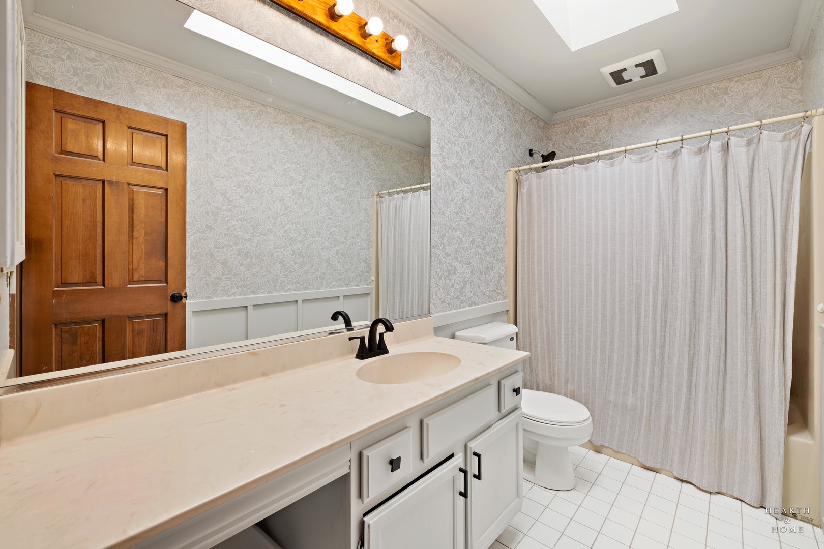 56 Huntcliff Court Fox River Grove, IL 60021 - Photo 18 of 42 a bathroom with a sink a toilet and shower