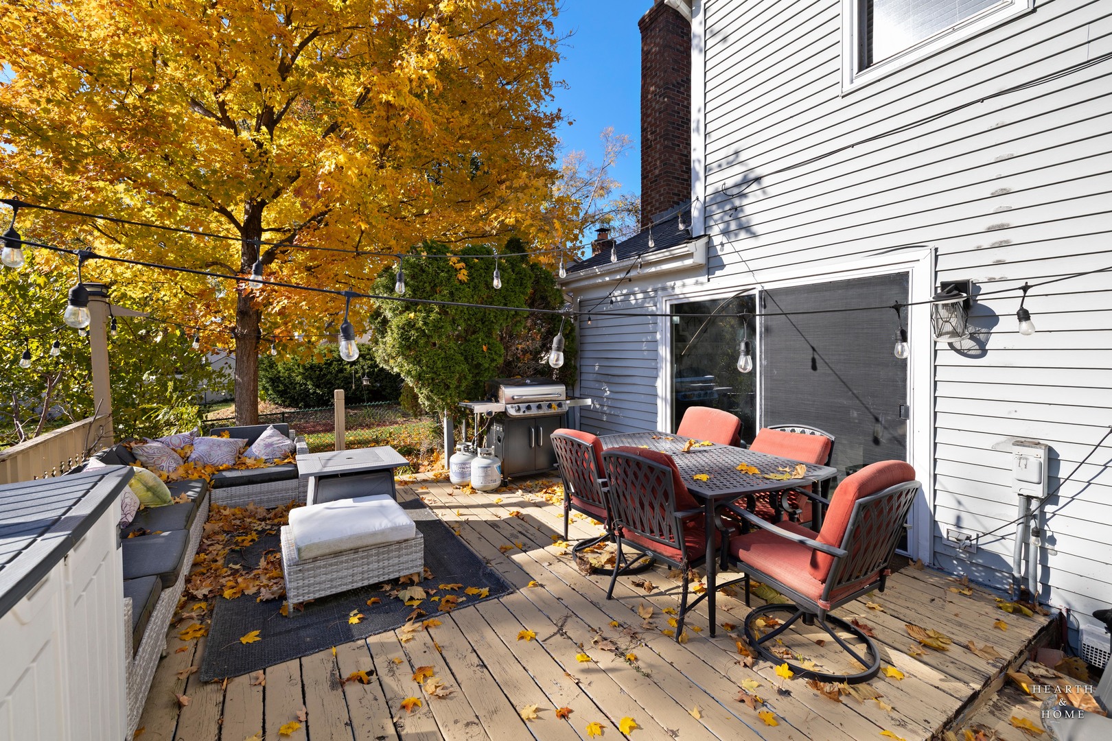 56 Huntcliff Court Fox River Grove, IL 60021 - Photo 35 of 42 a view of a patio with table and chairs and potted plants