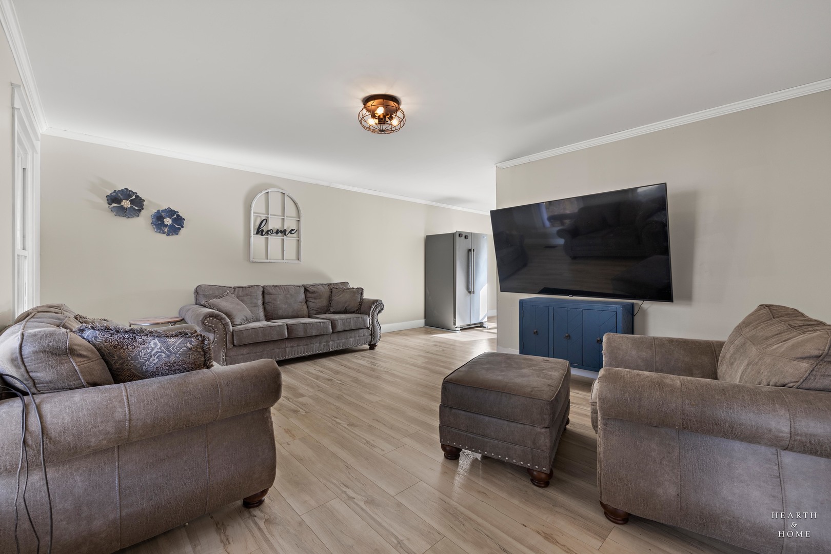56 Huntcliff Court Fox River Grove, IL 60021 - Photo 5 of 42 a living room with furniture and a flat screen tv
