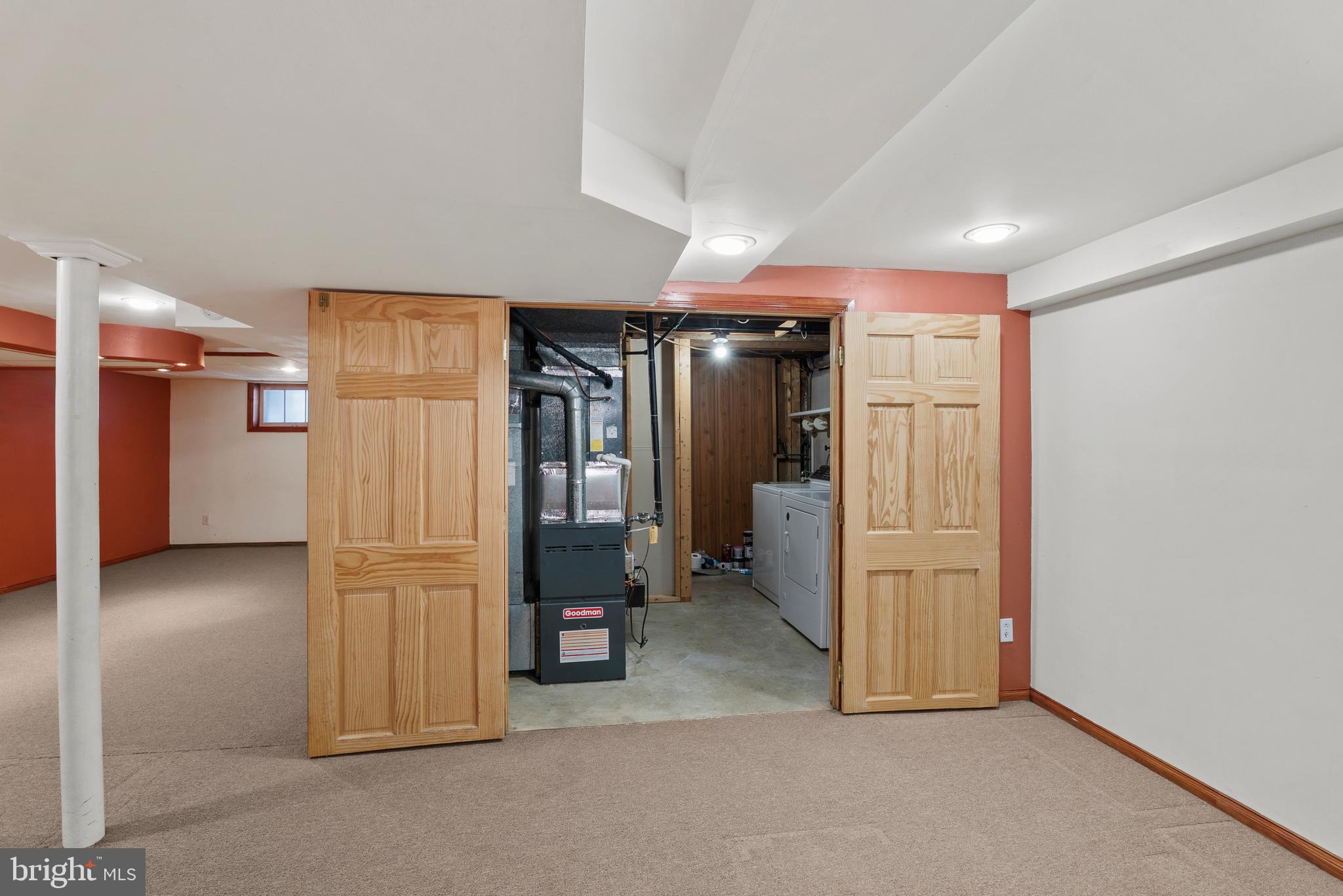 3823 Byfield Road Gwynn Oak, MD 21207 - Photo 35 of 42 a view of a hallway with furniture and a livingroom