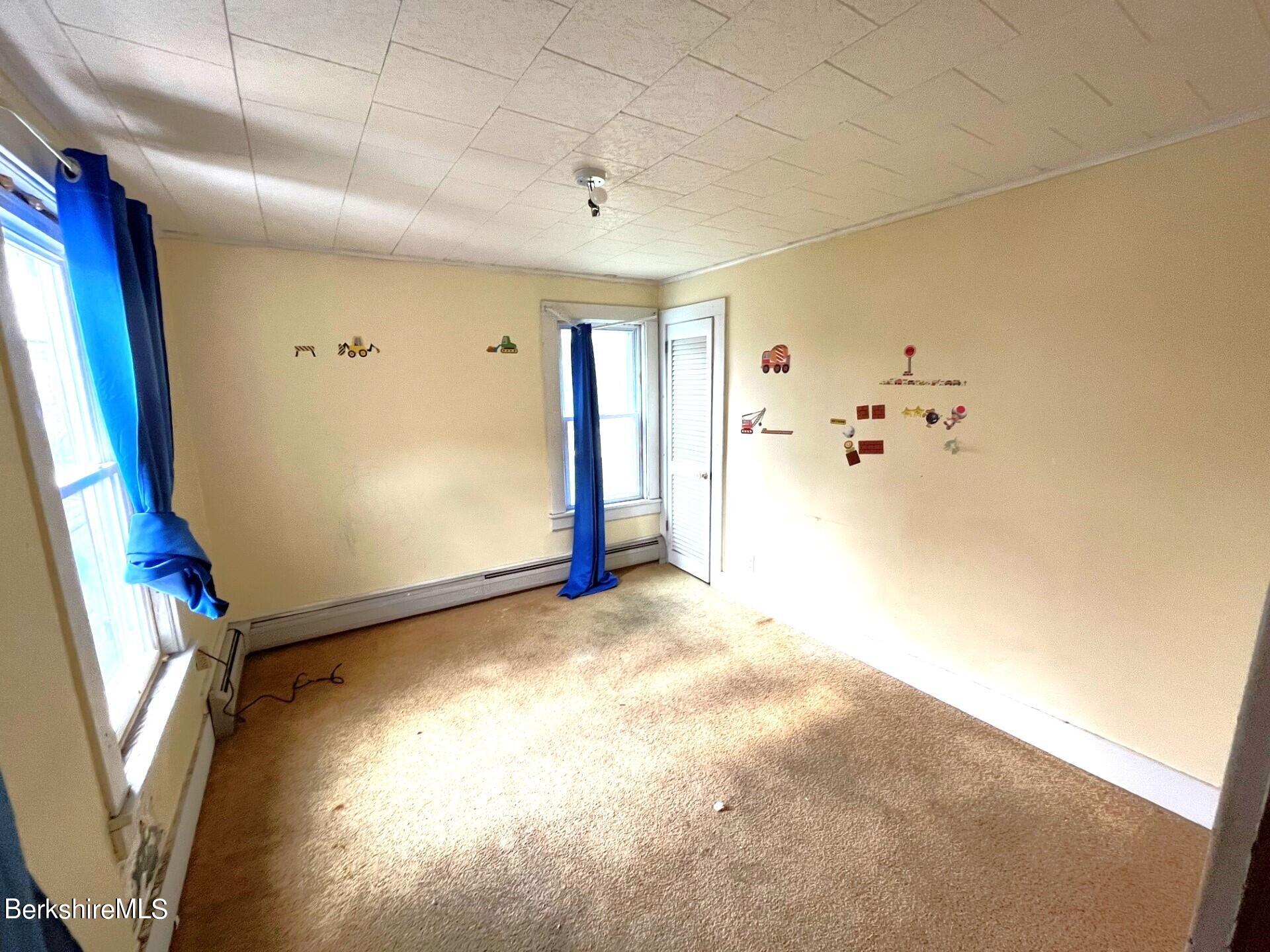 11 Goodrich Street North Adams, MA 01247 - Photo 15 of 35 a view of an empty room with a window