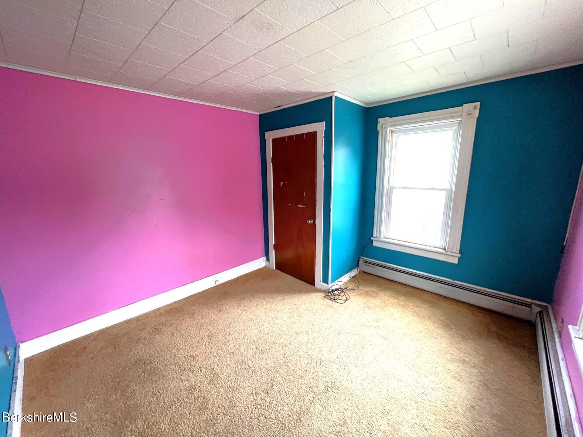 11 Goodrich Street North Adams, MA 01247 - Photo 20 of 35 an empty room with windows