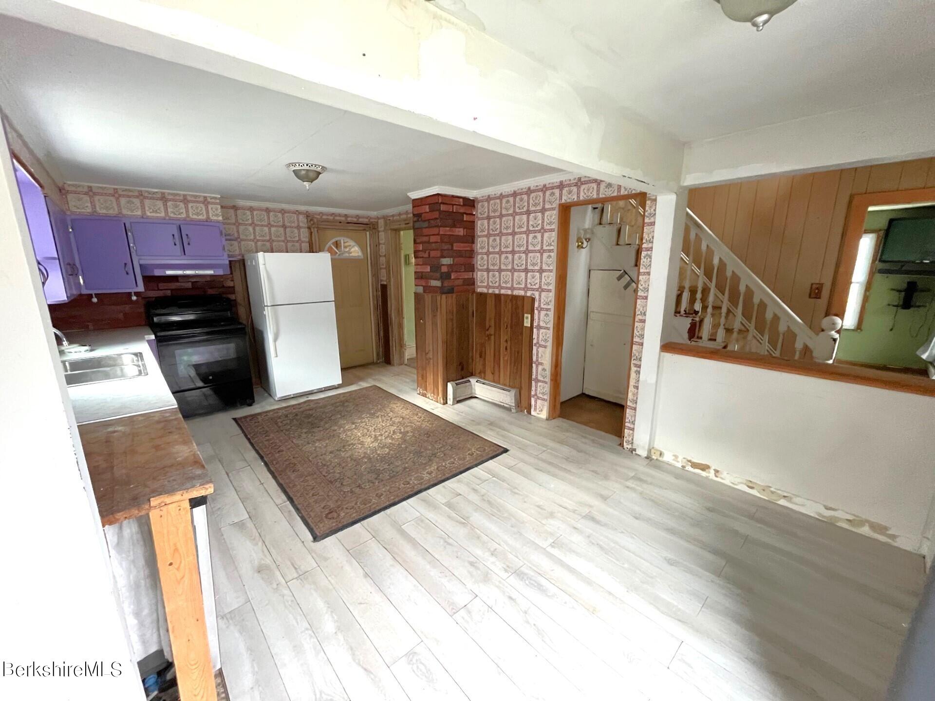 11 Goodrich Street North Adams, MA 01247 - Photo 6 of 35 a view of a living room with furniture