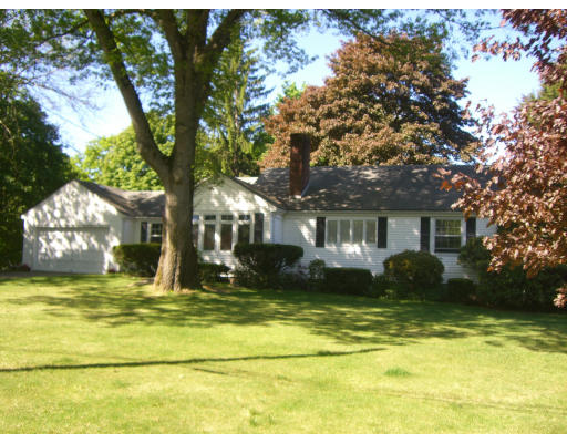 30 Dean Road Weston, MA 02493 - Photo 1 of 1 a view of a house with a swimming pool