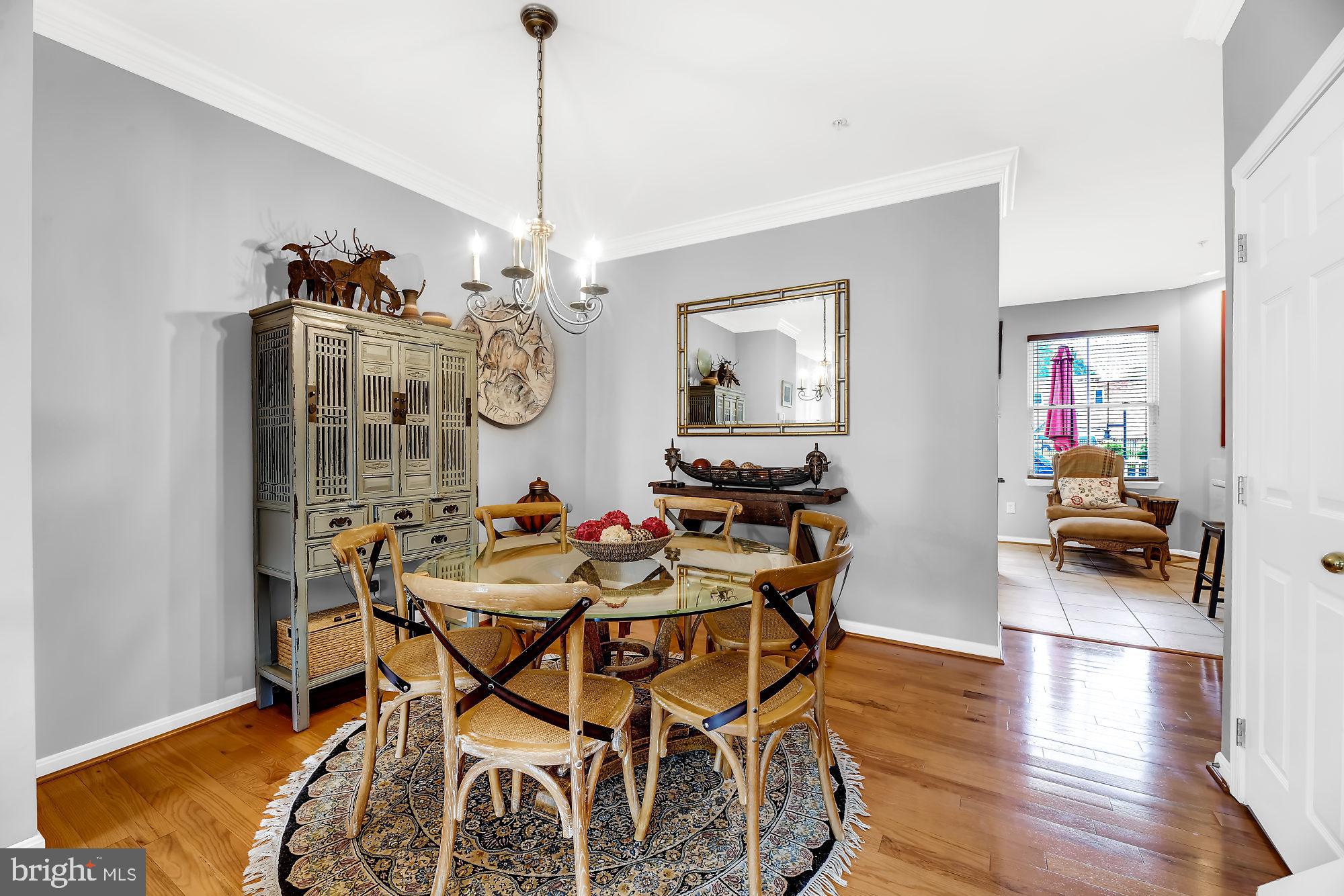 2090 Clipper Park Road Baltimore, MD 21211 - Photo 2 of 75 a view of a dining room with furniture and wooden floor