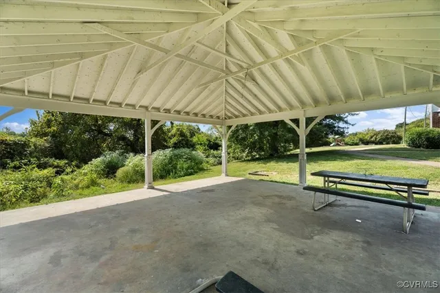 a view of a backyard with a patio