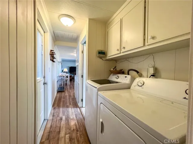a view of swimming pool with outdoor seating and yard