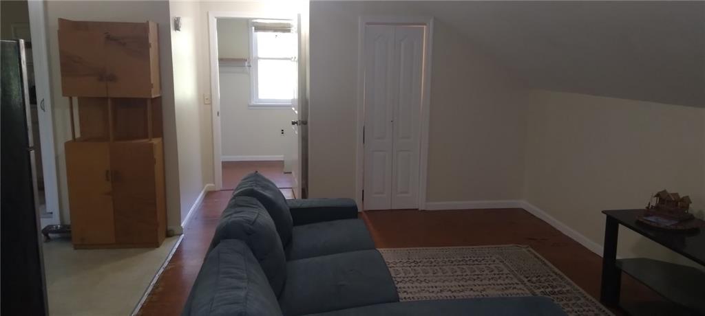 3043 Wells Street, Unit C Avondale Estates, GA 30002 - Photo 3 of 9 a living room with furniture and a rug