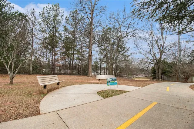 a view of a swimming pool with a patio