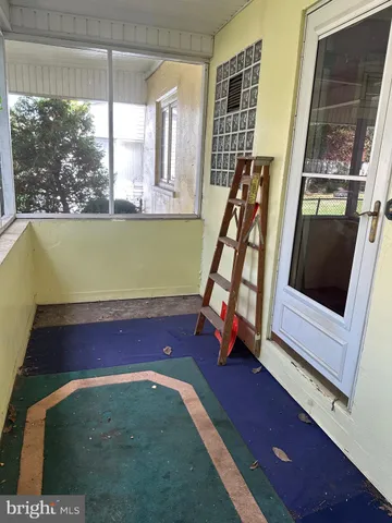 a bathroom with a sink and a large mirror