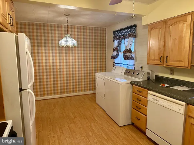 a view of empty room with fireplace