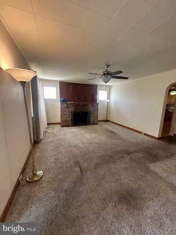 a view of a livingroom with a fireplace