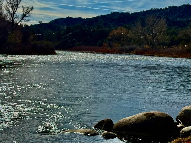 a view of a lake with a mountain
